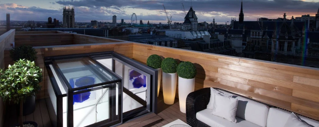 Skylight on top of terrace over looking city buildings
