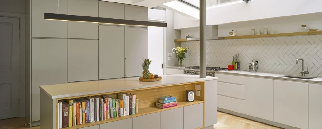 Shows a kitchen with skylight