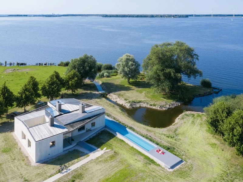 external view of house with swimming pool and surrounding garden