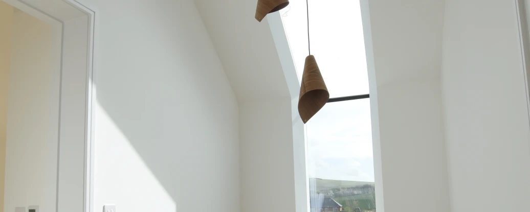 Eaves skylight above staircase