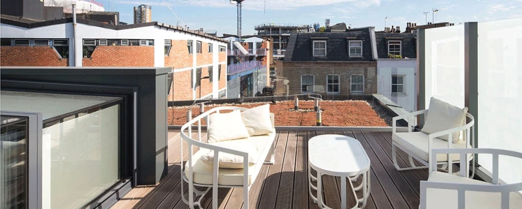 terrace with sofas next to skylight