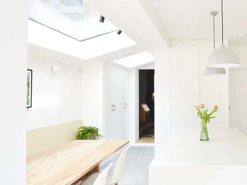 Pitchglaze roof window in dining area letting natural light shine in