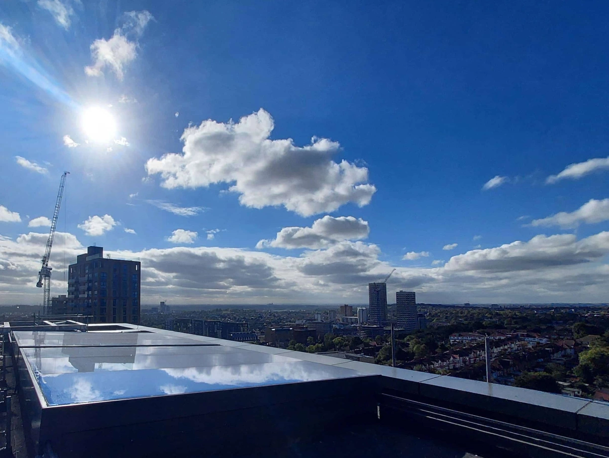 Building Rooftop Light Bespoke Sliding Rooflights Enhance Wembley Apartment Building | Glazing ...